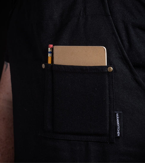 Heavy-Duty schwarze Canvas-Küchenschürze mit Telefon-/Stiftfach, abnehmbaren Küchentuchringen und Sweatshirt-Stil Tasche